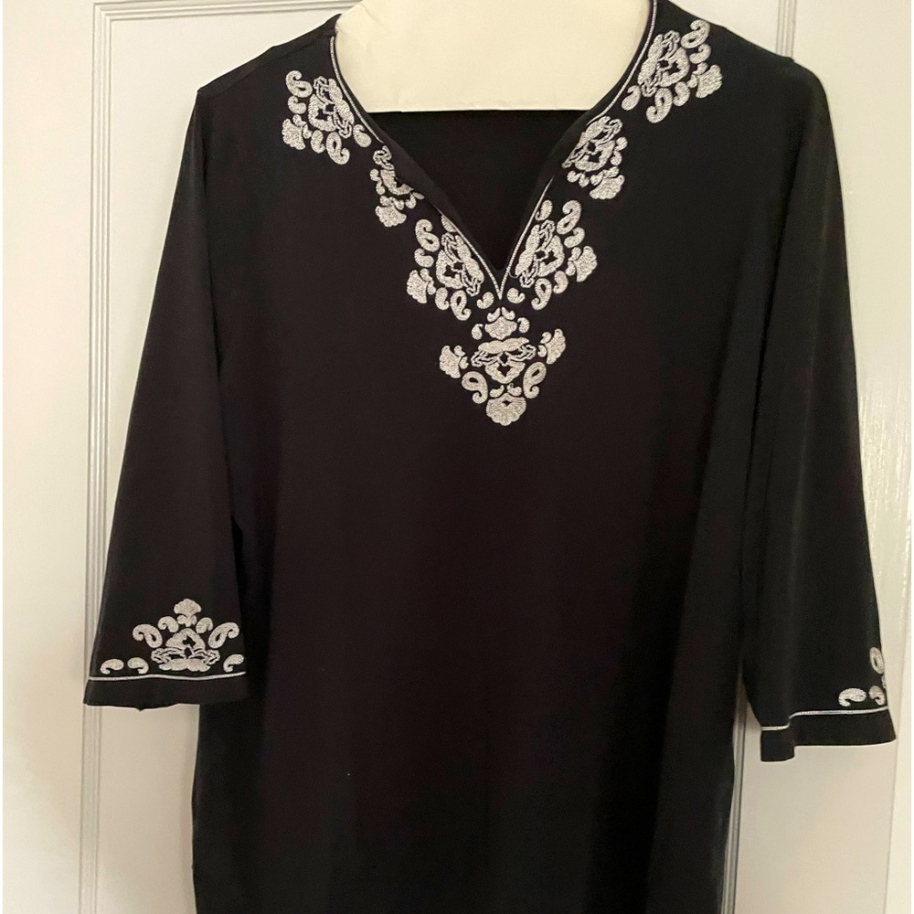 Black and white top embroidered at neck and sleeves